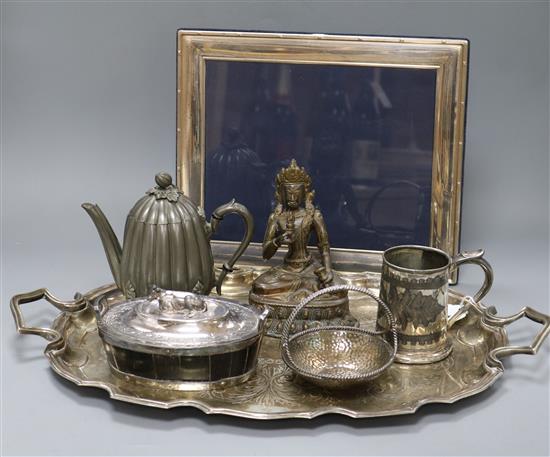 A quantity of plated and other metalware including a plated tray, a butter dish, a pewter teapot, a bronze Buddha,